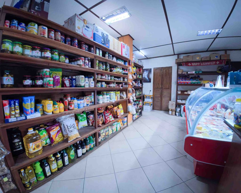 Organized shelves at the TipTop Delishop featuring a variety of international sauces, condiments, and dry goods hard to find elsewhere in Bohol.