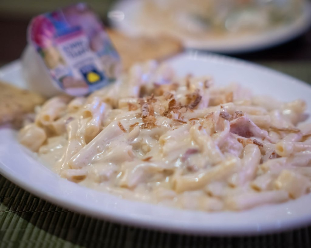 Authentic Swiss Älplermagronen at TipTop Bohol—hearty Alpine macaroni with potatoes, cheese, and crispy onions.